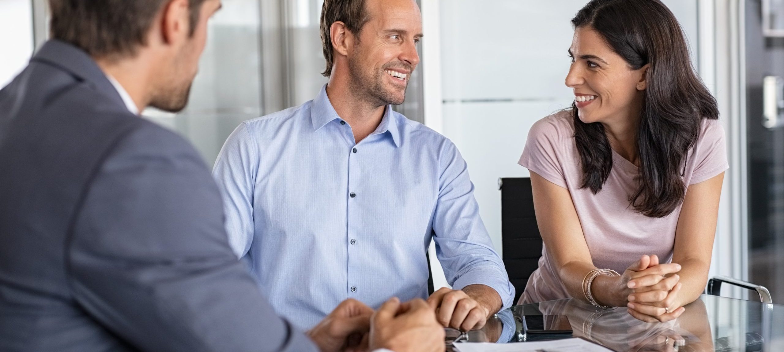 Mature couple meeting financial advisor,