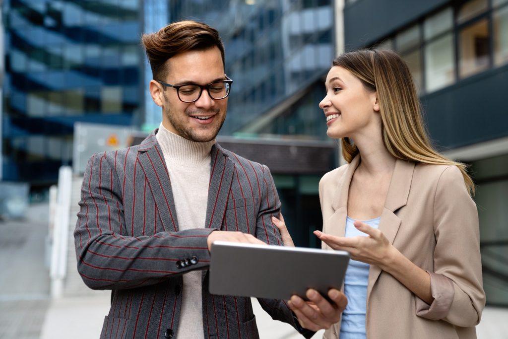 Diverse businesspeople having outdoor meeting 1