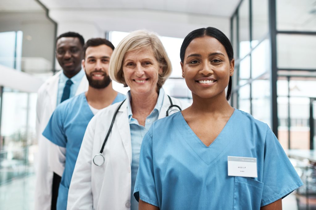 Portrait of a group of medical practitioners standing together in a hospital, salary packaging NSW Health