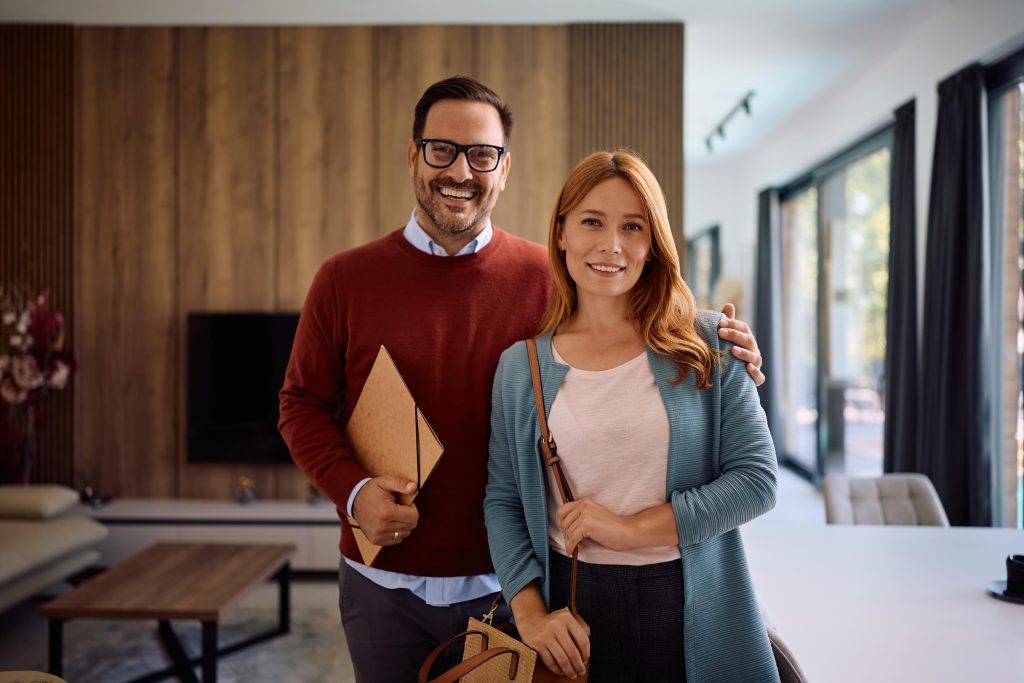 Smiling Couple Posing in a Modern home loan health check