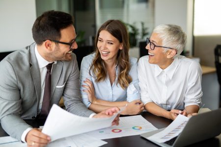 Collaboration and analysis by business people working in office